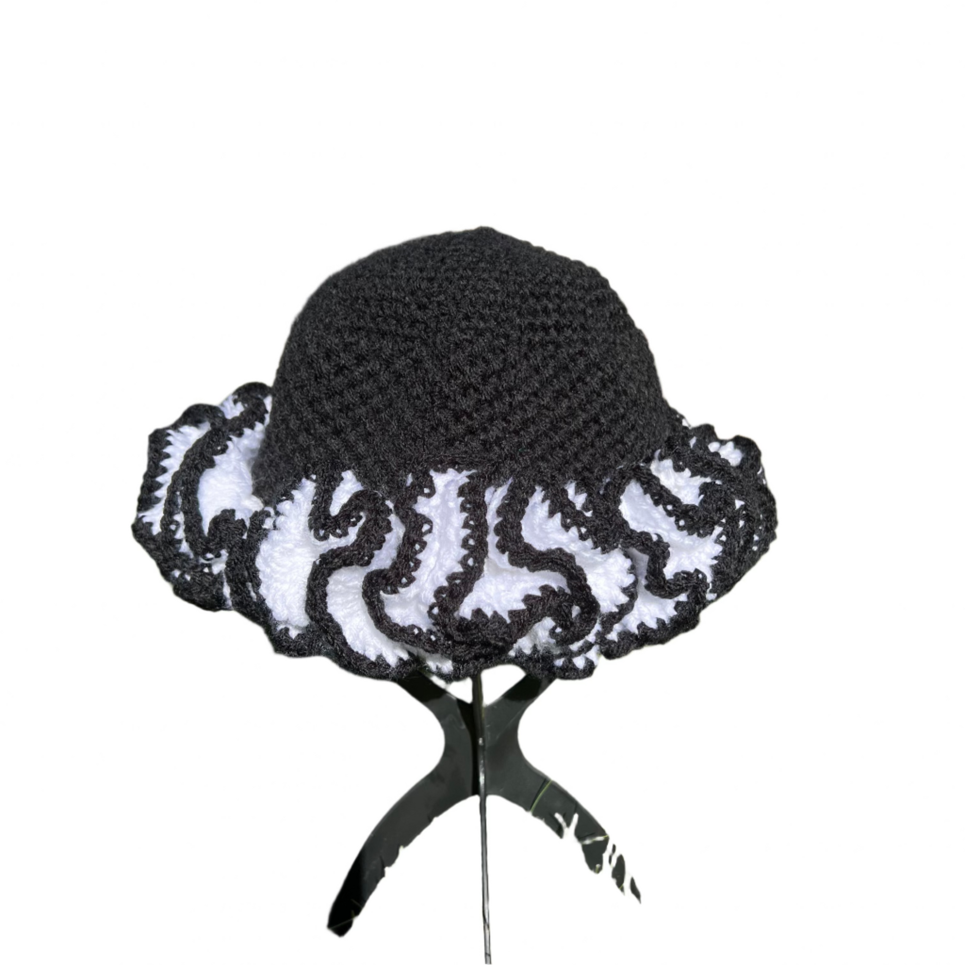Black and white African crochet ruffle hat with wavy edges handcrafted by ThreadsByHannah