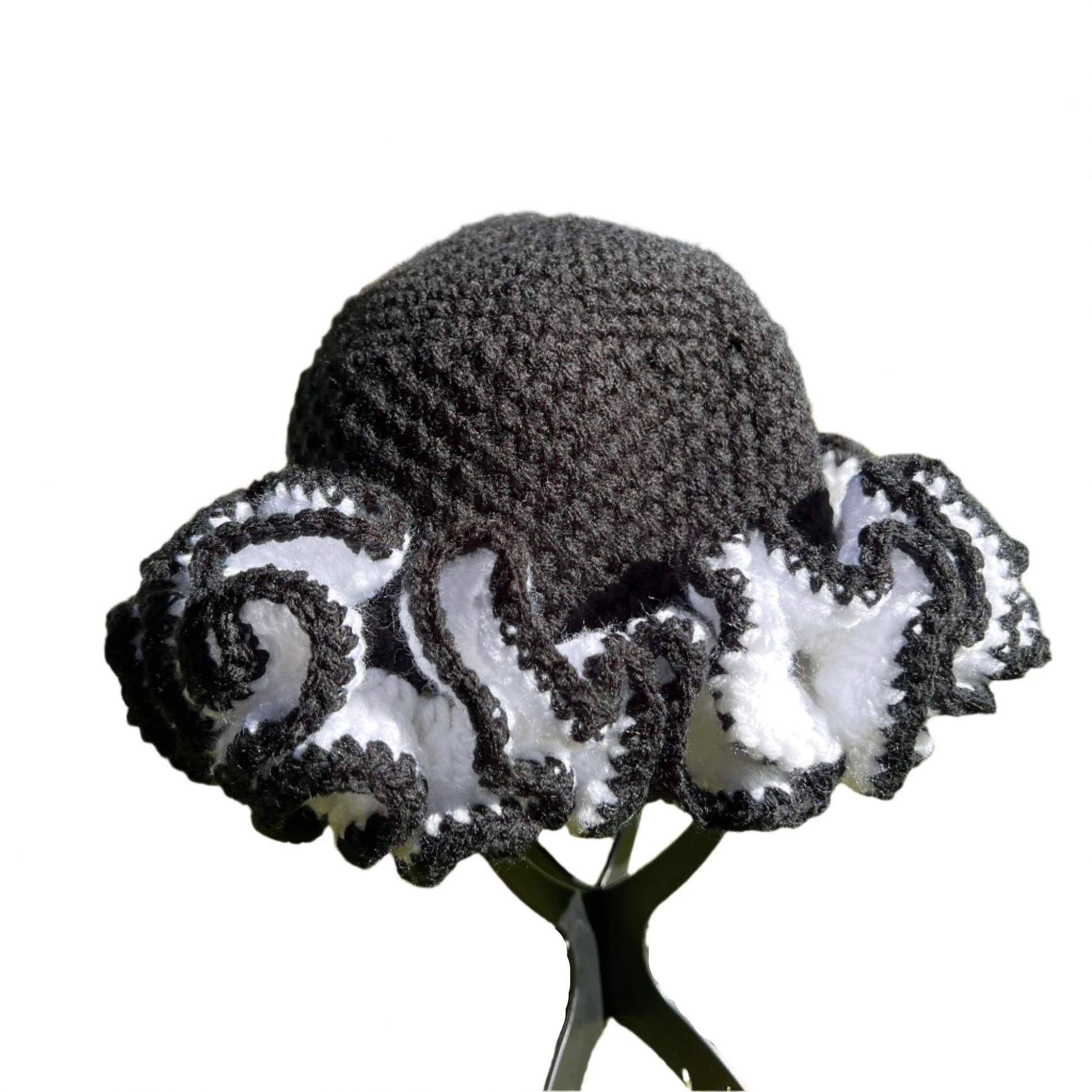 African crochet ruffle hat in black and white with detailed ruffled edges handcrafted by ThreadsByHannah