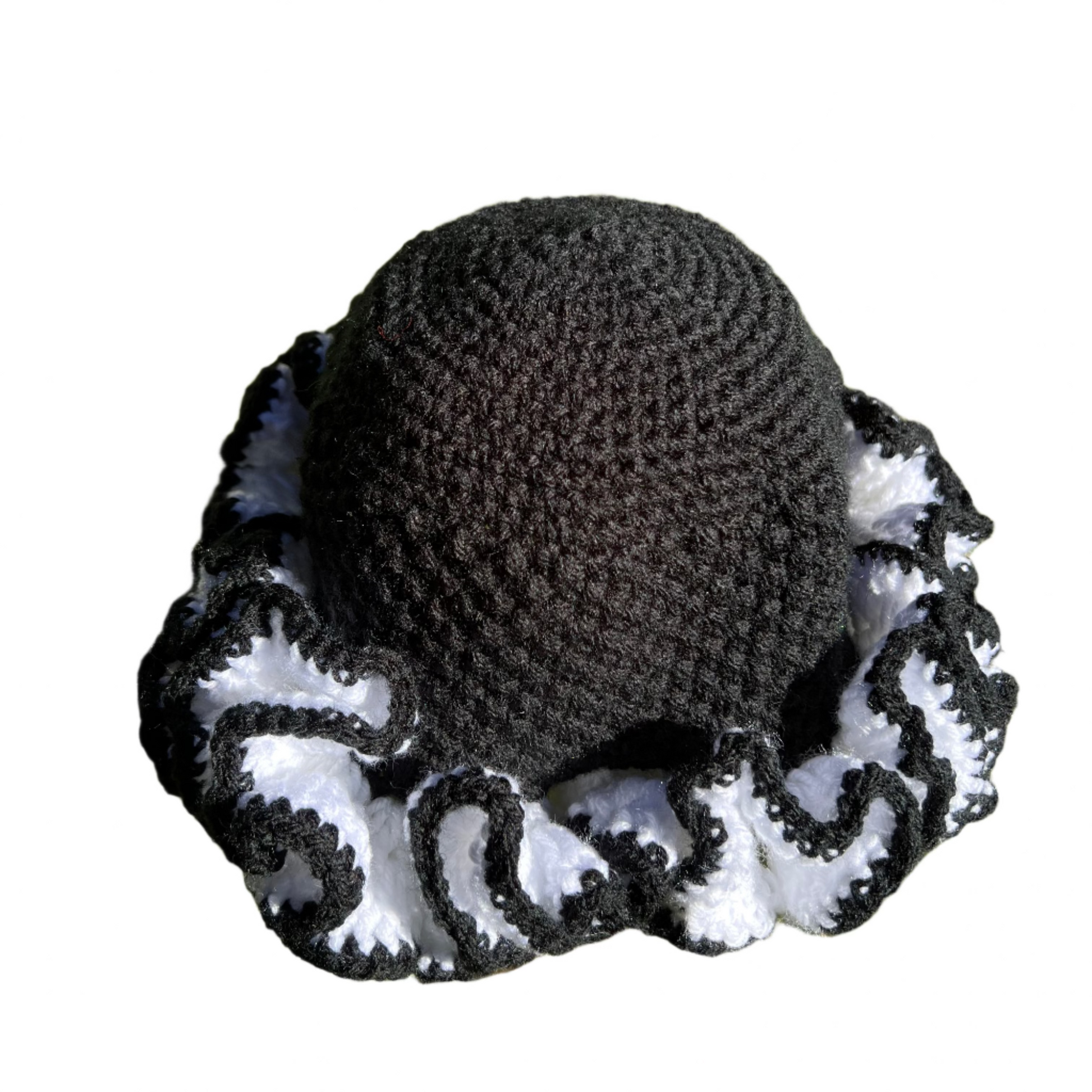 Black and white African crochet ruffle hat with detailed ruffled edges by ThreadsByHannah