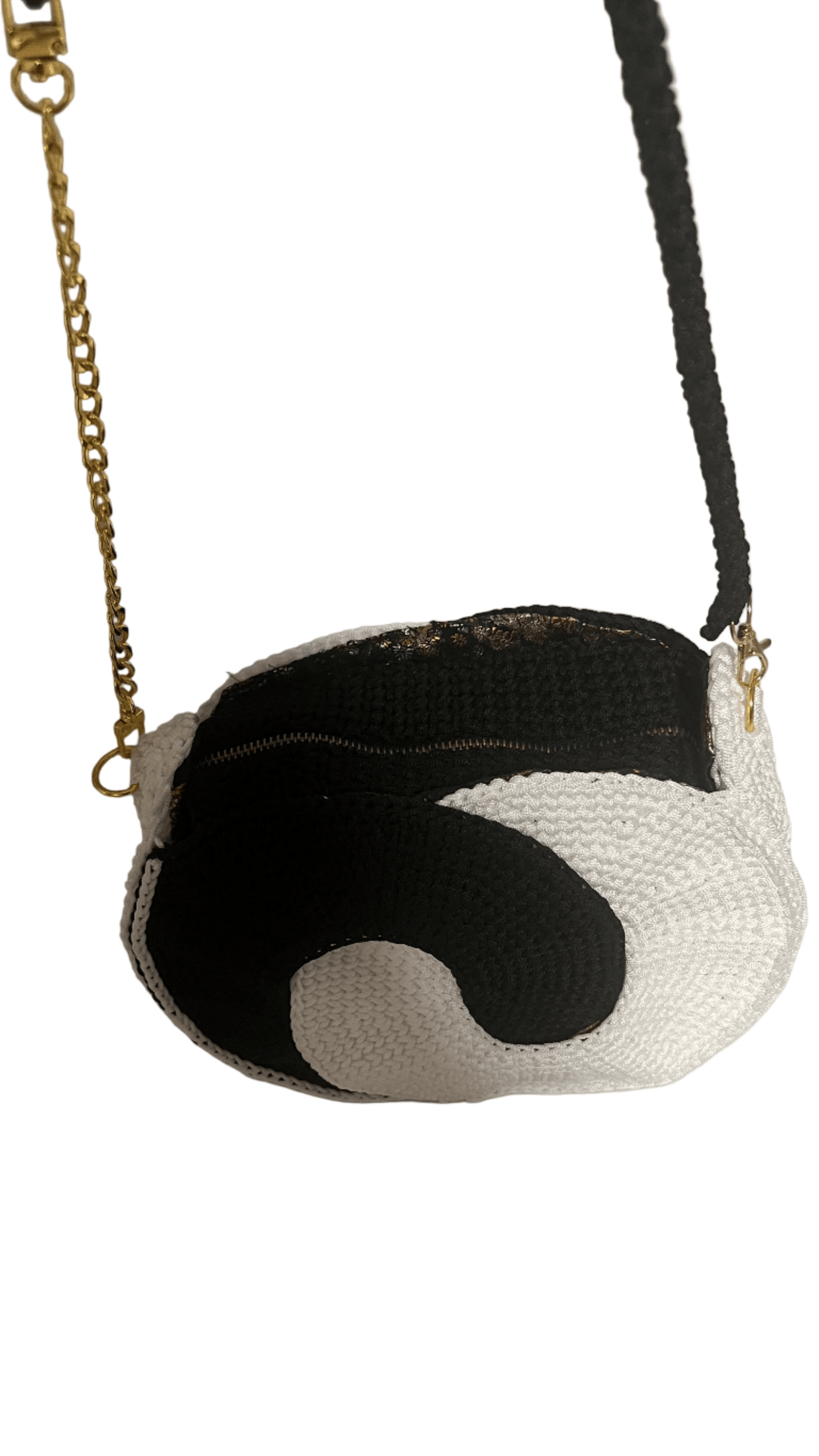 African Handmade Crochet Sling Purse with stylish black and white design and chain strap