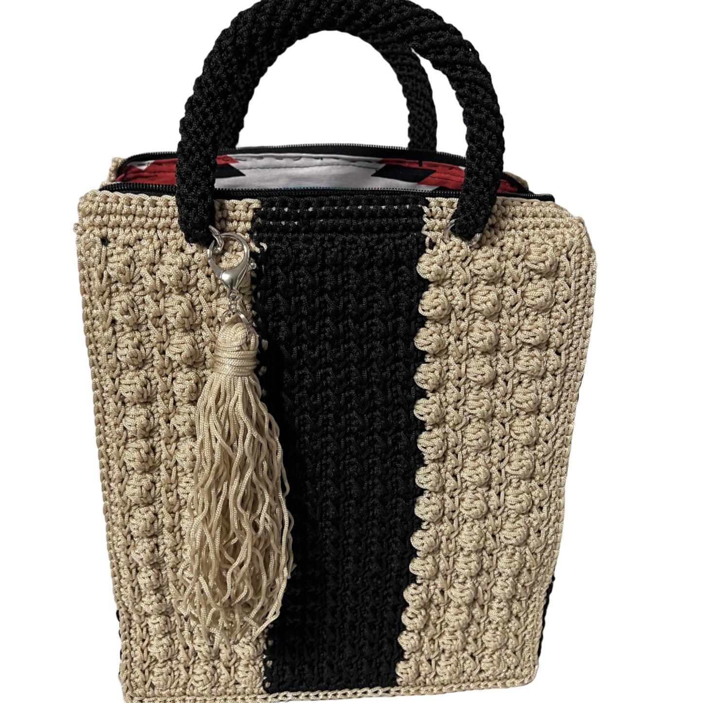 Handcrafted bohemian tote bag with a textured design and stylish tassel detail