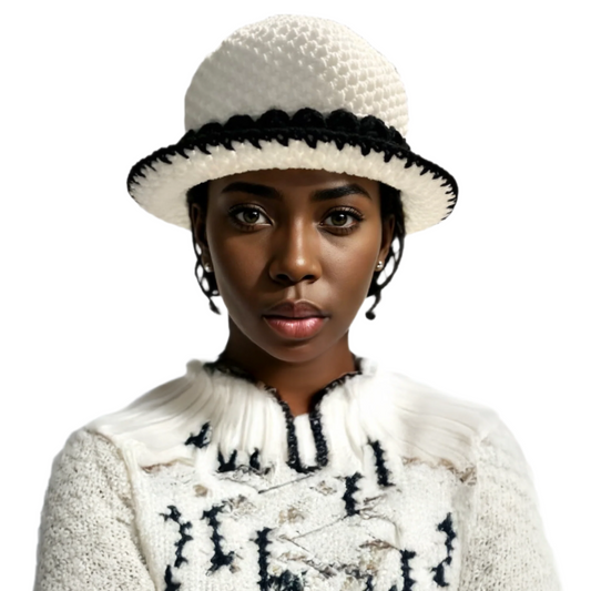 Handmade black and white bucket hat worn by woman with matching knit sweater by ThreadsByHannah