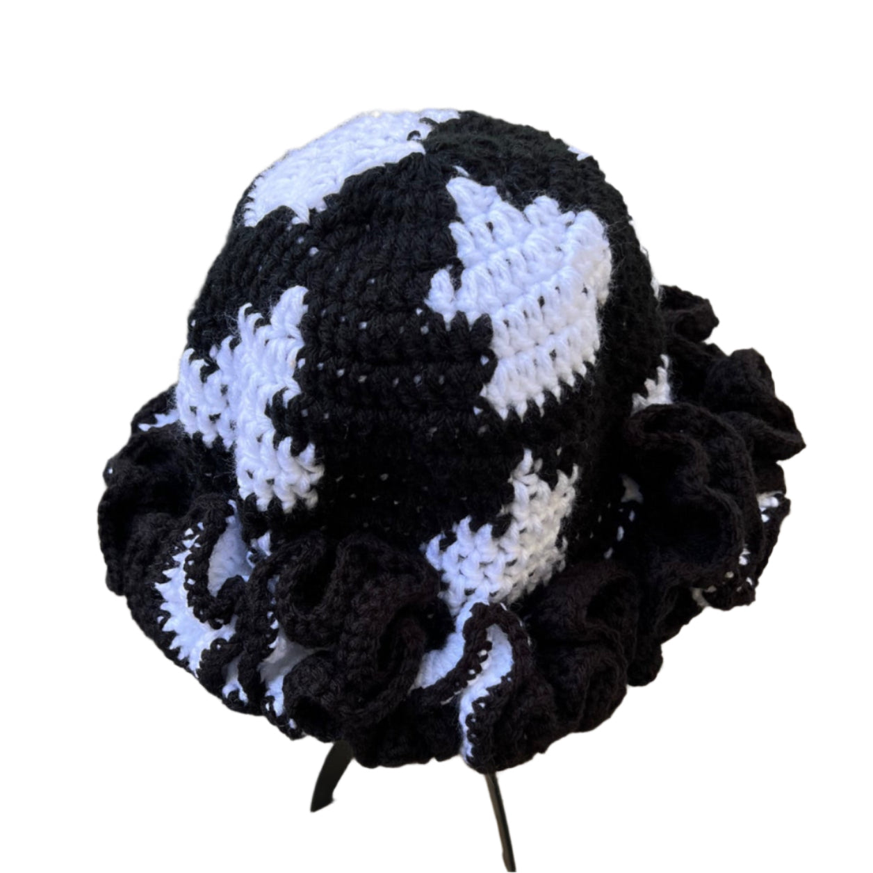 Handmade black and white ruffle hat by ThreadsByHannah with textured crochet design