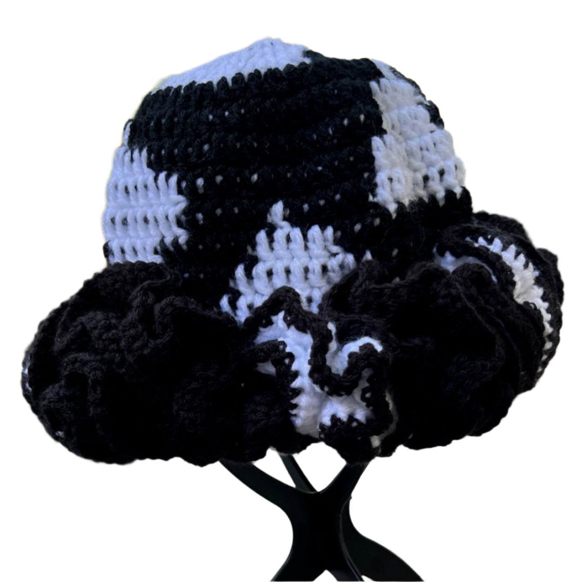 Handmade black and white ruffle hat with crocheted pattern by ThreadsByHannah