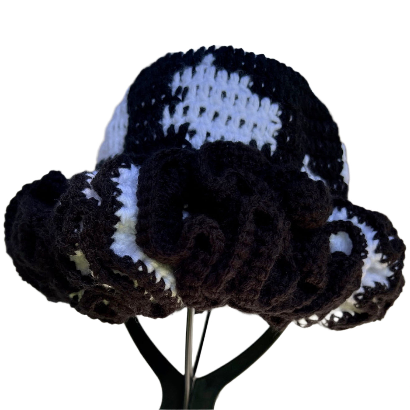 Handmade black and white ruffle hat by ThreadsByHannah with detailed crochet design