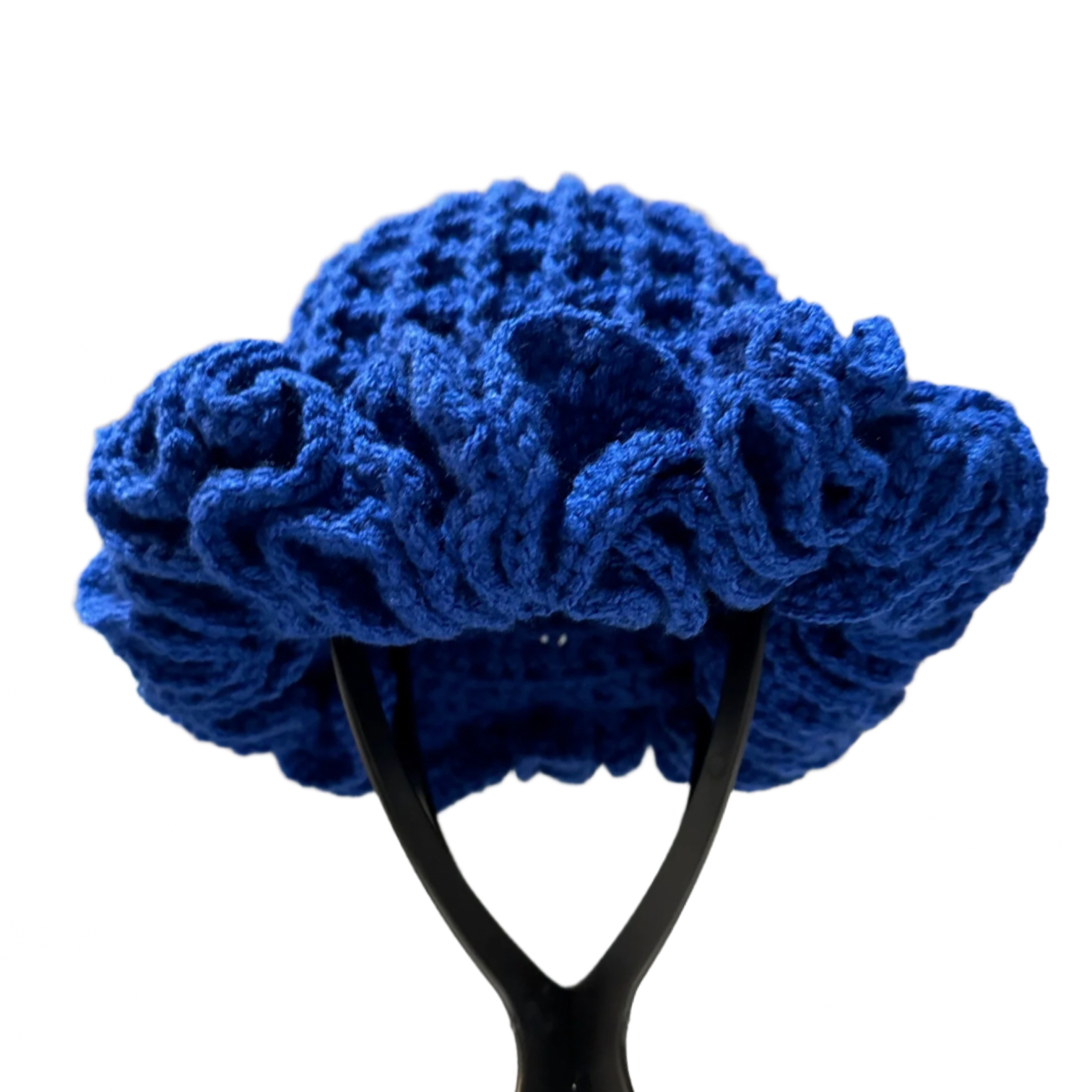 Handmade blue ruffle hat knitted with thick yarn displayed on a black stand