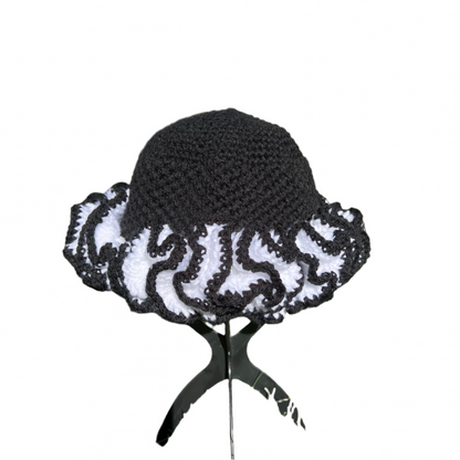 Black and white african crochet ruffle hat with intricate wavy edges by ThreadsByHannah
