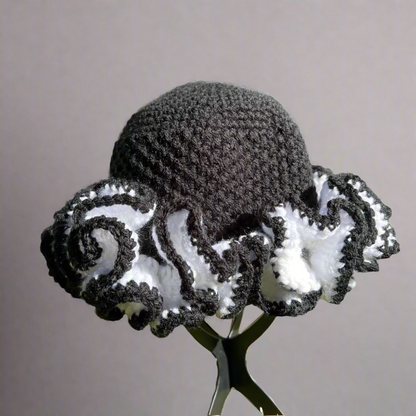 ThreadsByHannah black and white african crochet ruffle hat with intricate ruffle design