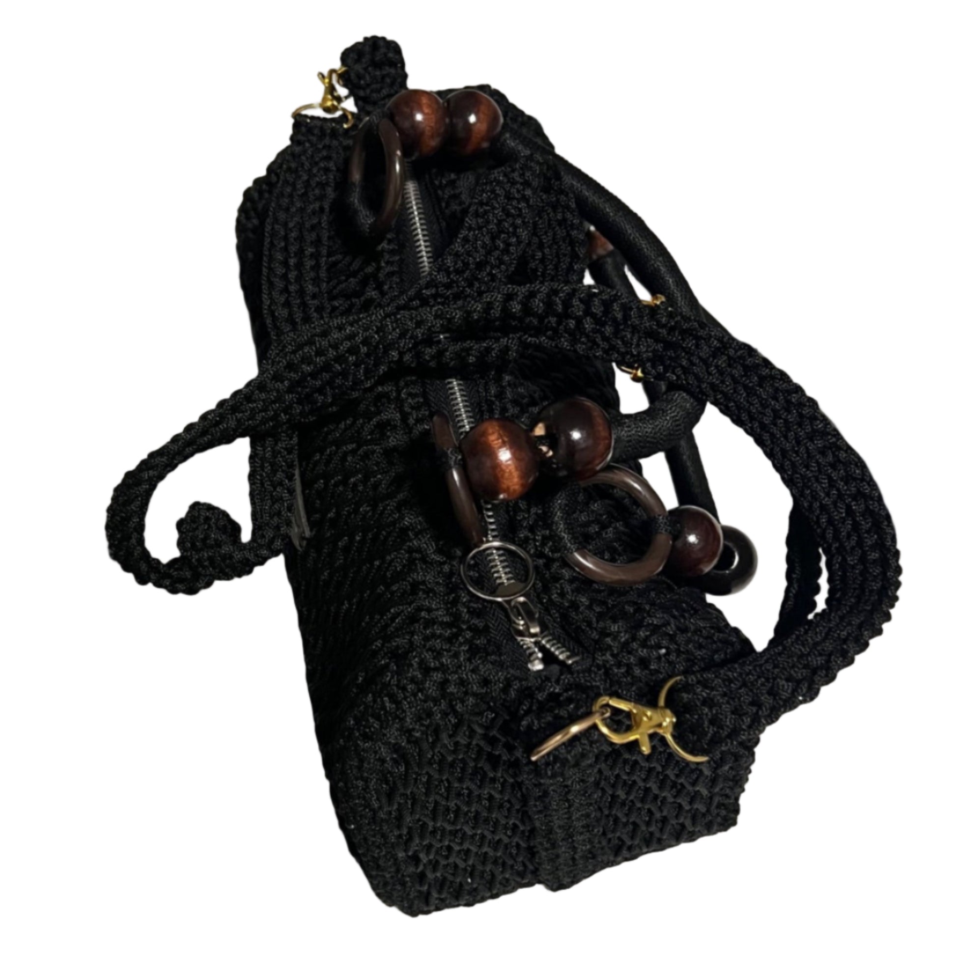 African handmade crochet Sling handbag with wooden accents and zip closure for stylish carry
