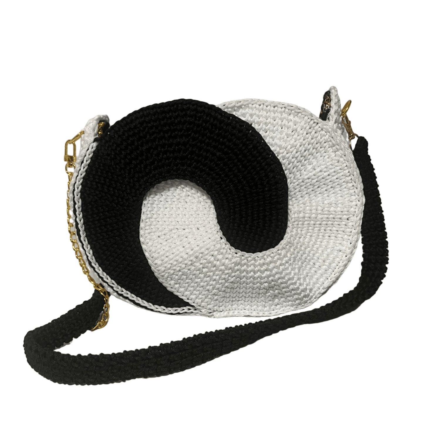 African Handmade Crochet Sling Purse in black and white with a unique spiral design and adjustable strap