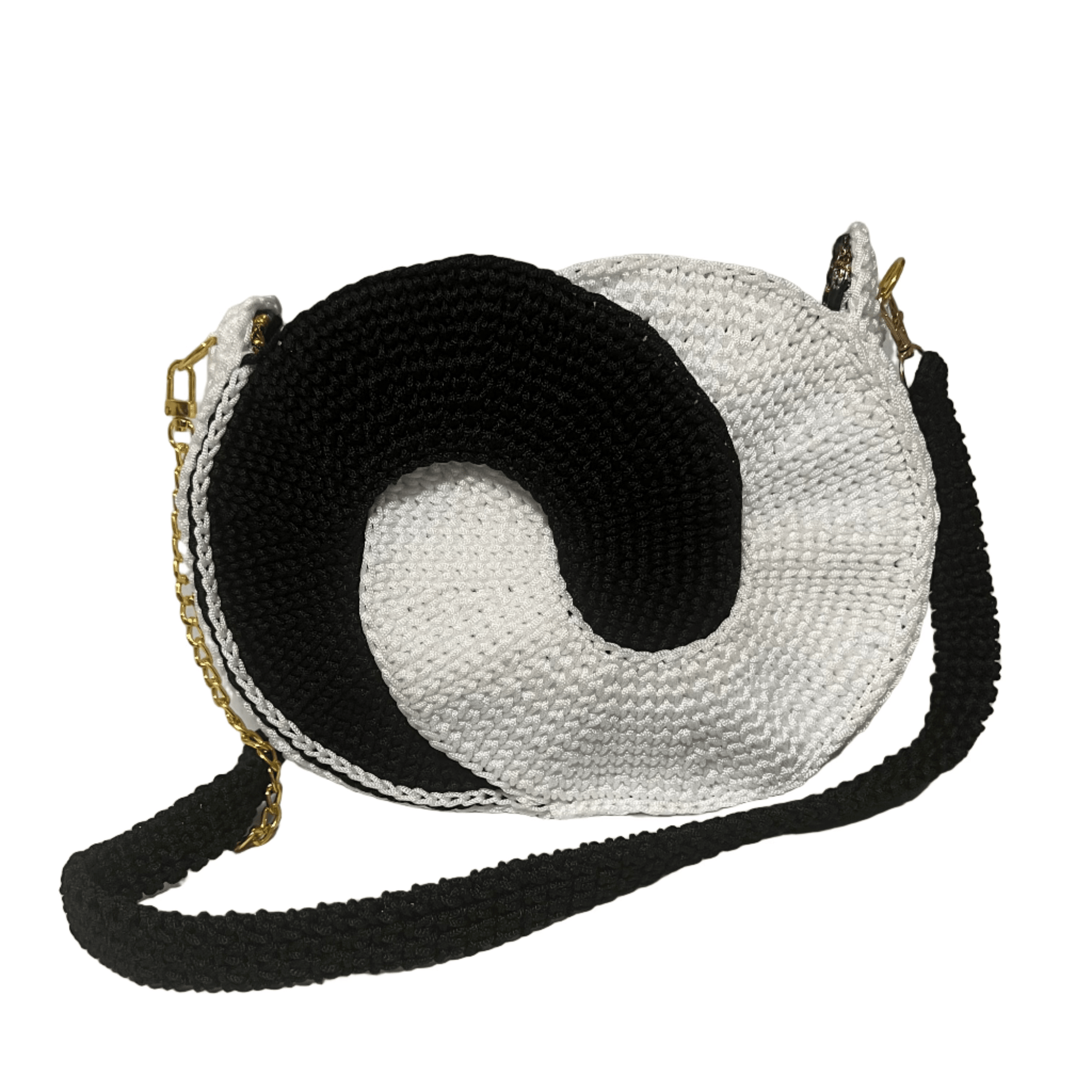 African Handmade Crochet Sling Purse in black and white with a unique spiral design and adjustable strap