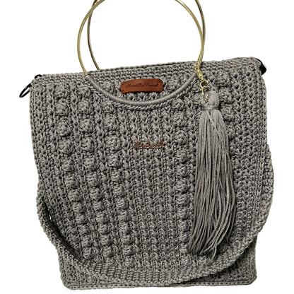 African handmade Trapezoid handbag in gray with tassel and structured design for stylish use