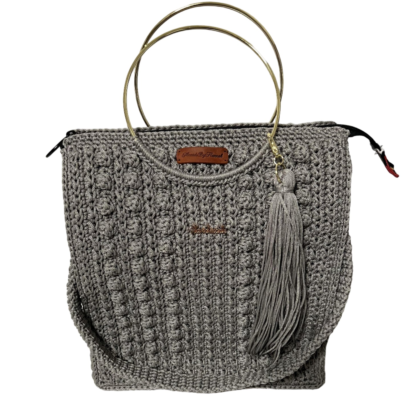 African handmade Trapezoid handbag in gray with stylish tassel and gold handles