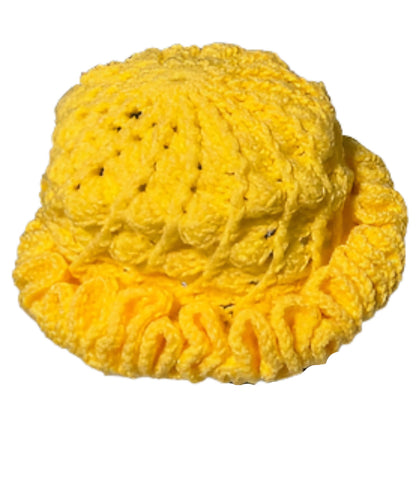 Yellow ruffle hat handmade by ThreadsByHannah showcasing African heritage crochet accessories style