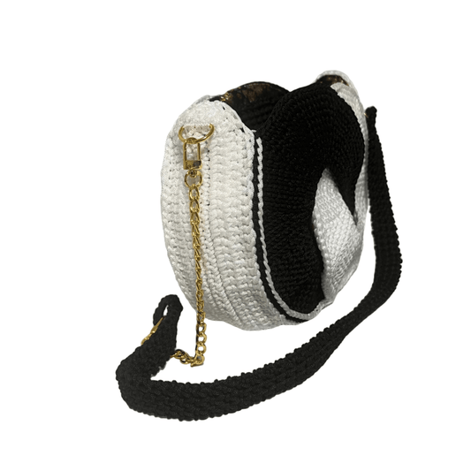 African Handmade Crochet Purse black and white round crossbody bag with gold chain accent and long strap