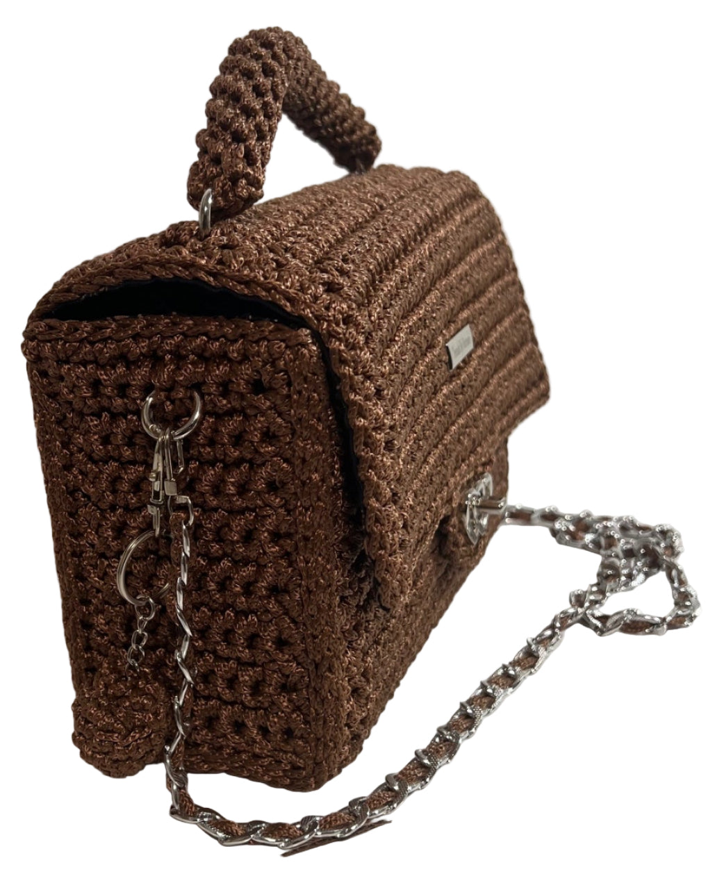 Brown artisan woven evening purse with a stylish handle and chain strap for elegant outings