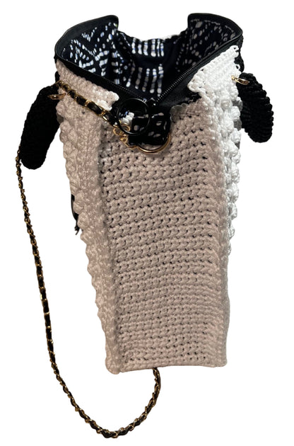 Boho black and white shoulder bag with textured crochet design and gold chain strap