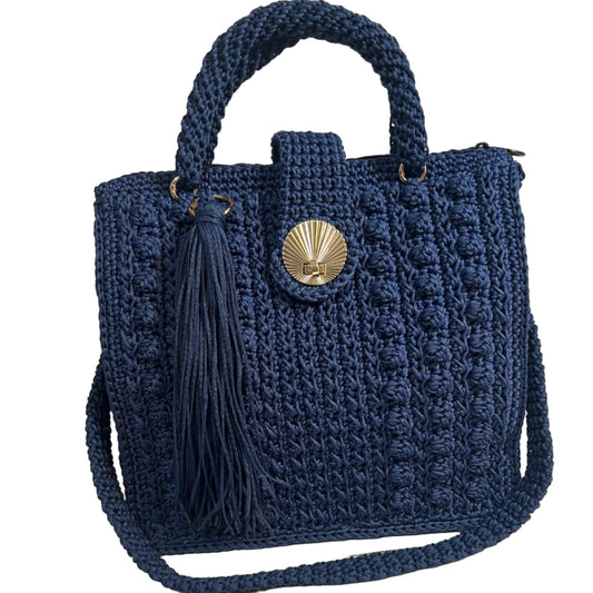 Navy crochet shoulder bag for women with a stylish tassel and gold-tone clasp