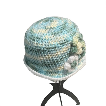ThreadsByHannah floral crochet Bucket Hat for kids in blue and cream with decorative flowers