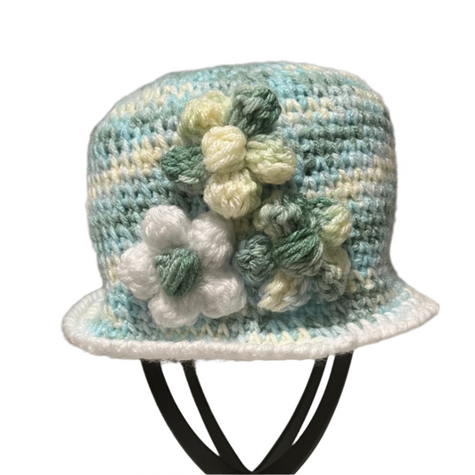 Floral crochet Bucket Hat for kids in pastel colors with decorative flower patterns by ThreadsByHannah