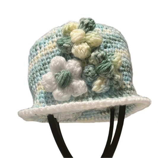 ThreadsByHannah floral crochet Bucket Hat for kids in blue, white, and yellow yarn with flower details