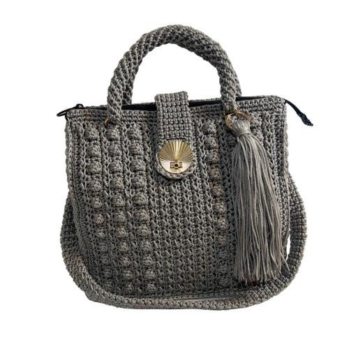 Stylish grey crochet shoulder bag for women with a tassel and elegant clasp detail