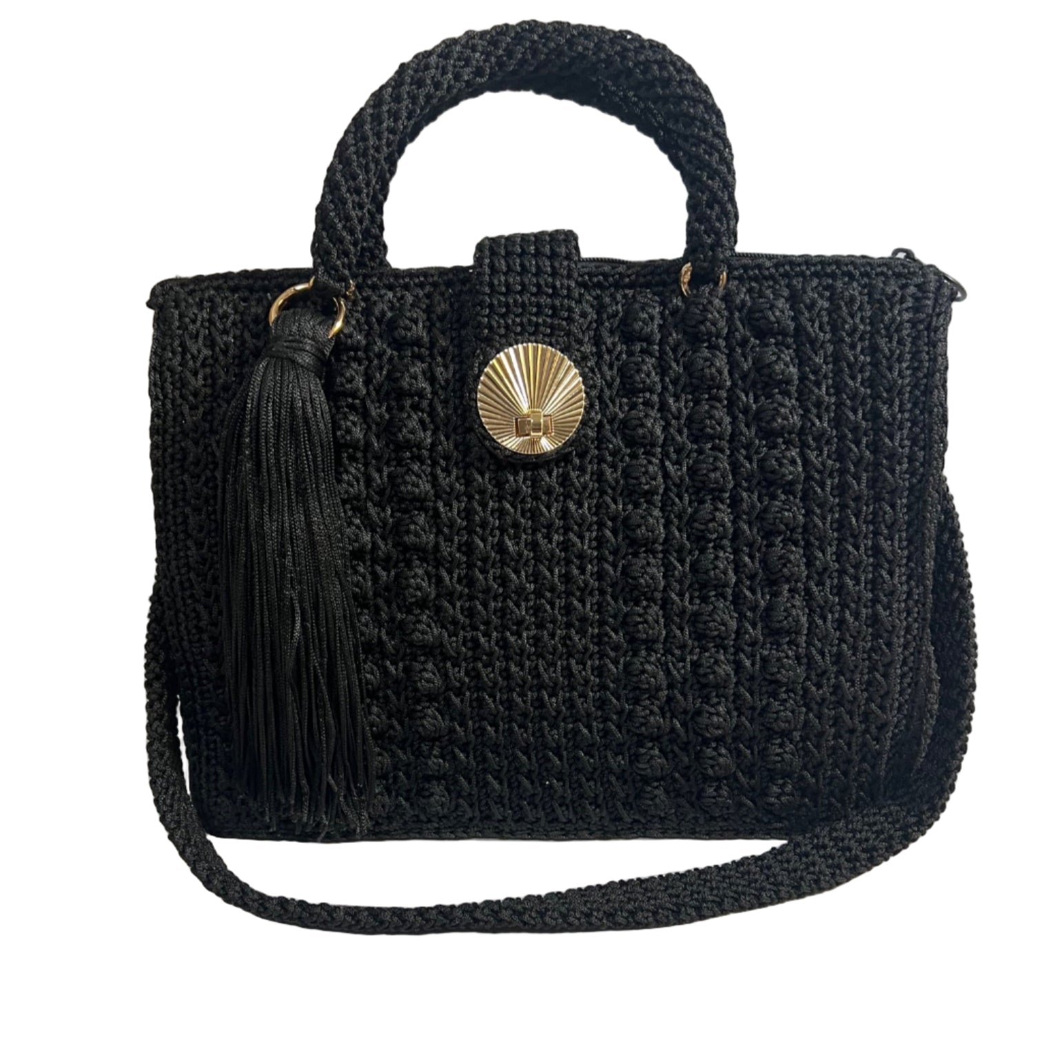 Handcrafted black sling handbag with a textured design and tassel detail for stylish casual outings