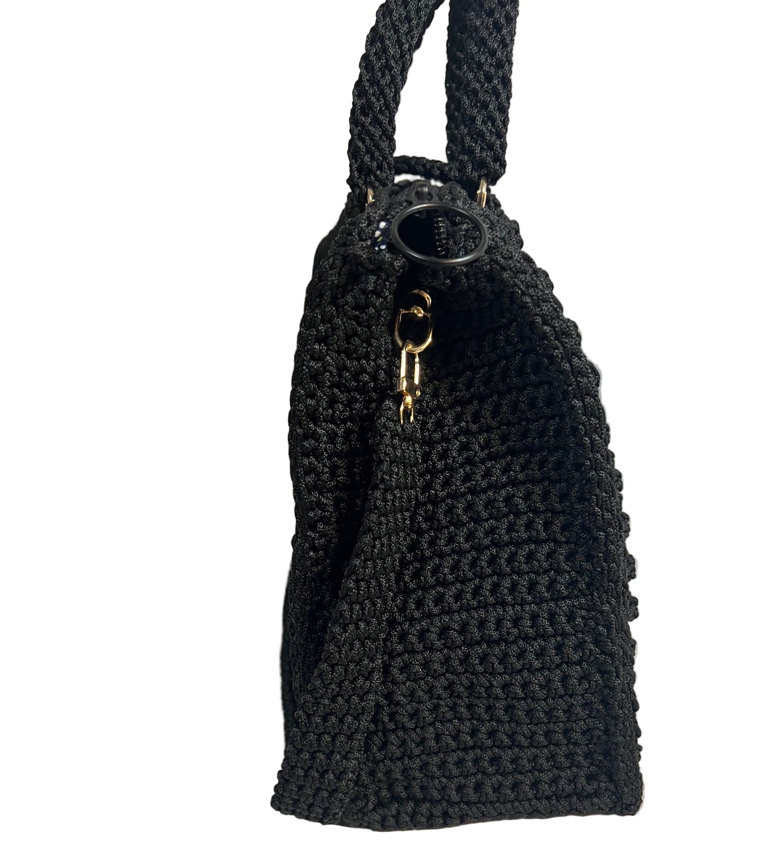 Handcrafted black sling handbag with textured crochet design and gold detailing