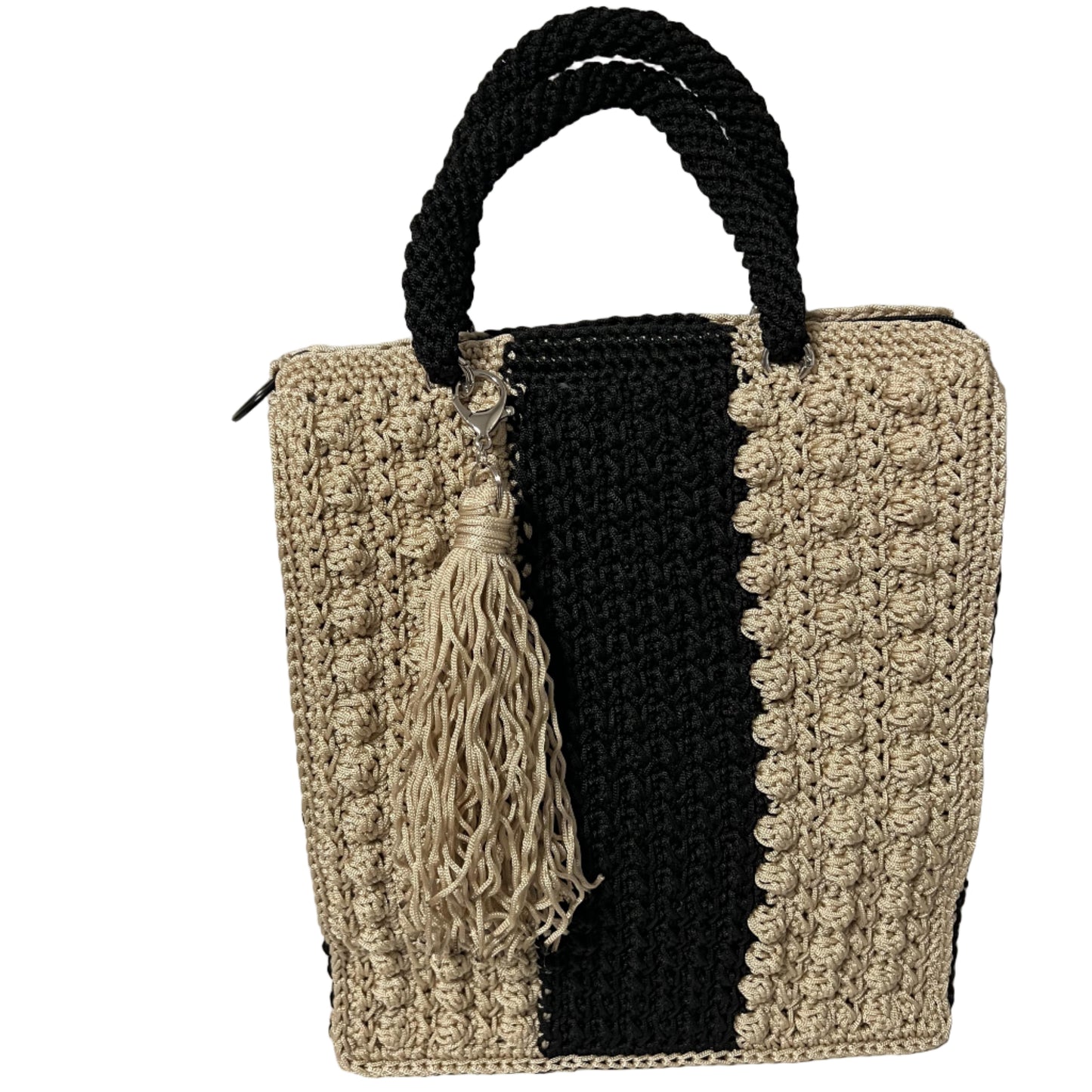 Handcrafted bohemian tote bag from ThreadsByHannah with a stylish tassel and unique trapezoid shape