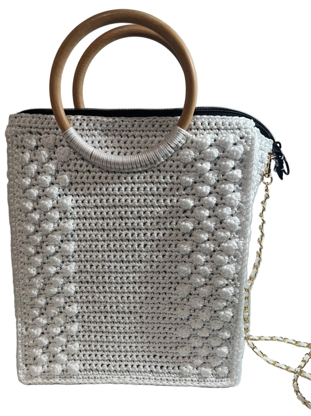 Handcrafted trapezoid handbag by ThreadsByHannah featuring a unique design and wooden handles