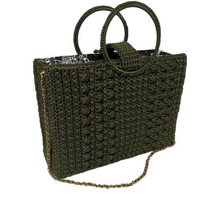 Handcrafted Trapezoid handbag with chain featuring a textured design and unique round handles