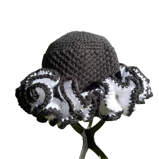 Black and white african crochet ruffle hat with intricate ruffled edge by ThreadsByHannah