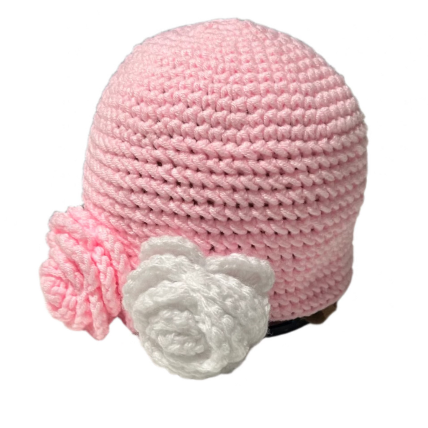 Pink handmade beanie for girls ages 4-10 with white and pink crocheted flower decoration
