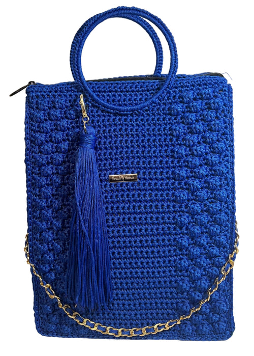 Handmade blue African print handbag with a stylish tassel and gold chain strap
