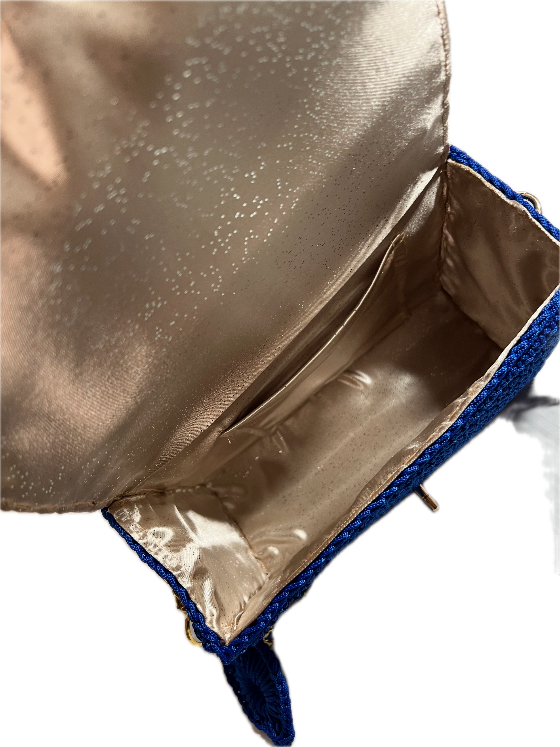 Interior view of a Handmade Blue Crochet Clutch Handbag Purse with satin lining and spacious compartment