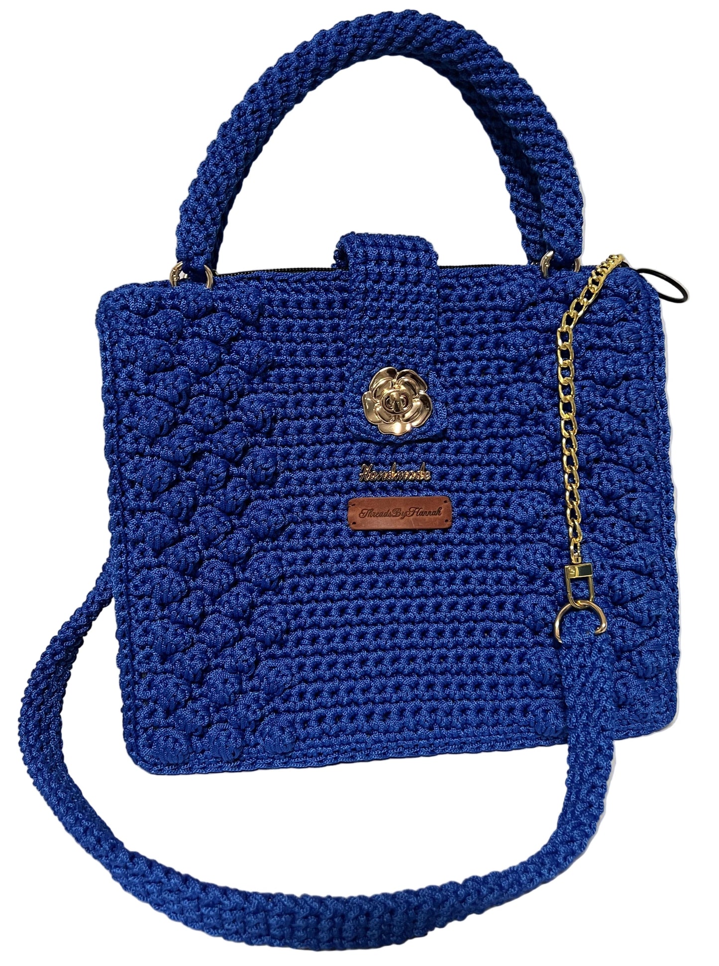 Handmade Blue Crochet Trapezoid Handbag with a stylish design and gold-tone clasp