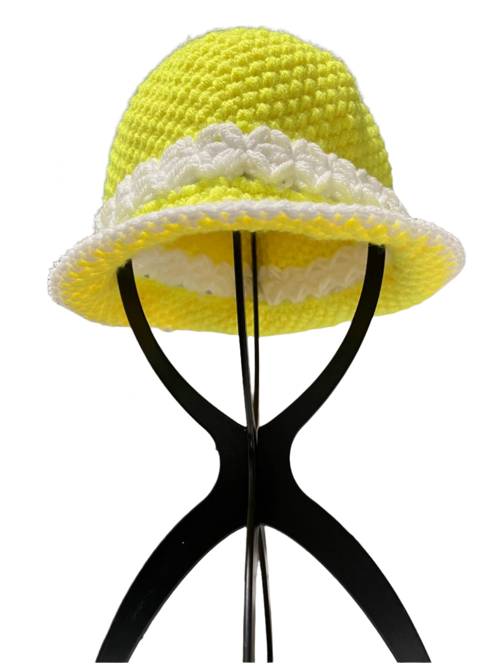 Handmade crochet bucket hat in yellow and white displayed on a black stand by ThreadsByHannah