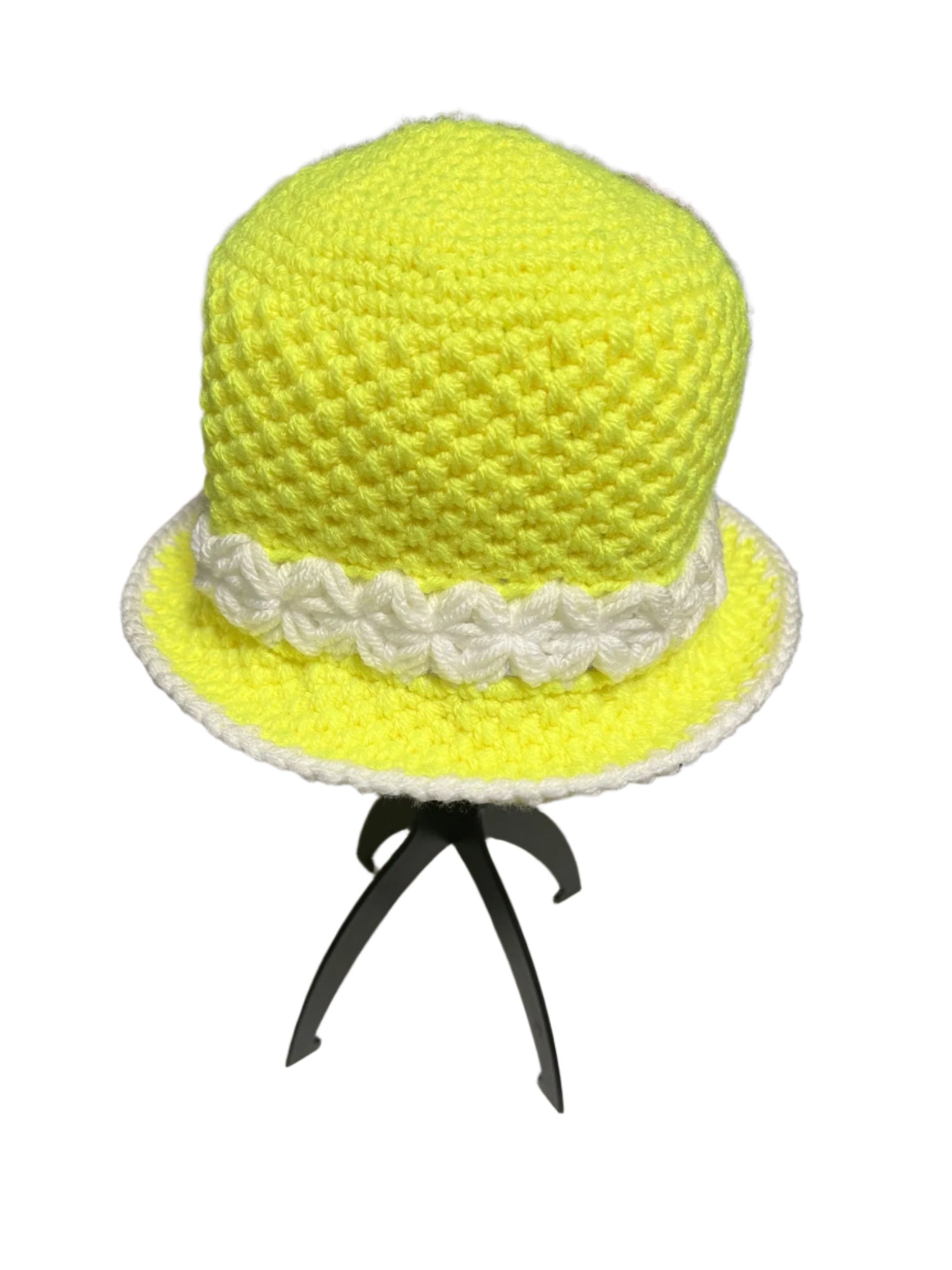 Bright yellow handmade crochet bucket hat with white trim and decorative white band