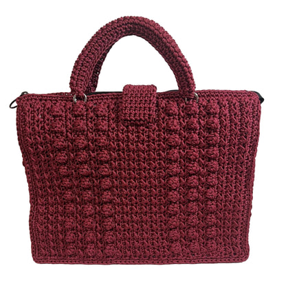 Handmade red sling handbag from ThreadsByHannah with textured crochet design and sturdy handles