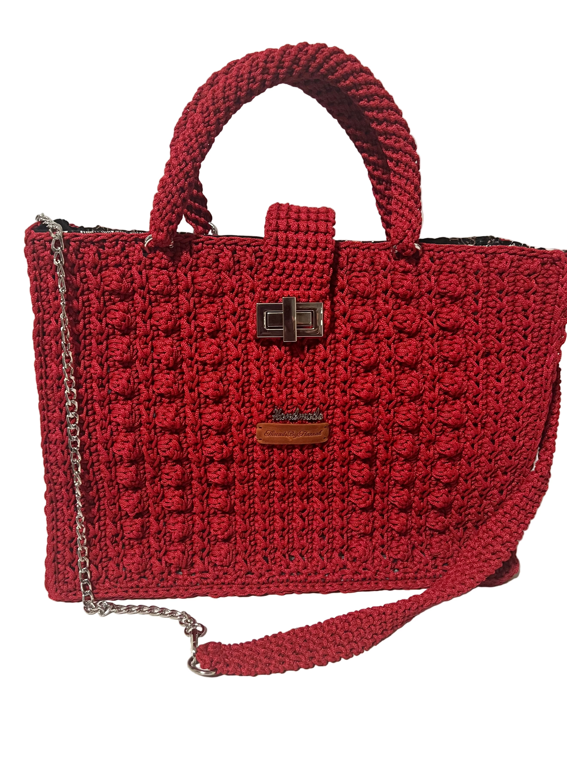 Handmade red Trapezoid handbag with a textured finish and detachable shoulder strap