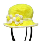 Little Sunshine Baby Crochet Hat in bright yellow with white flower accents and a white trim bucket style