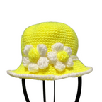 Yellow Little Sunshine Baby Crochet Hat with white flower accents and a white brim trim